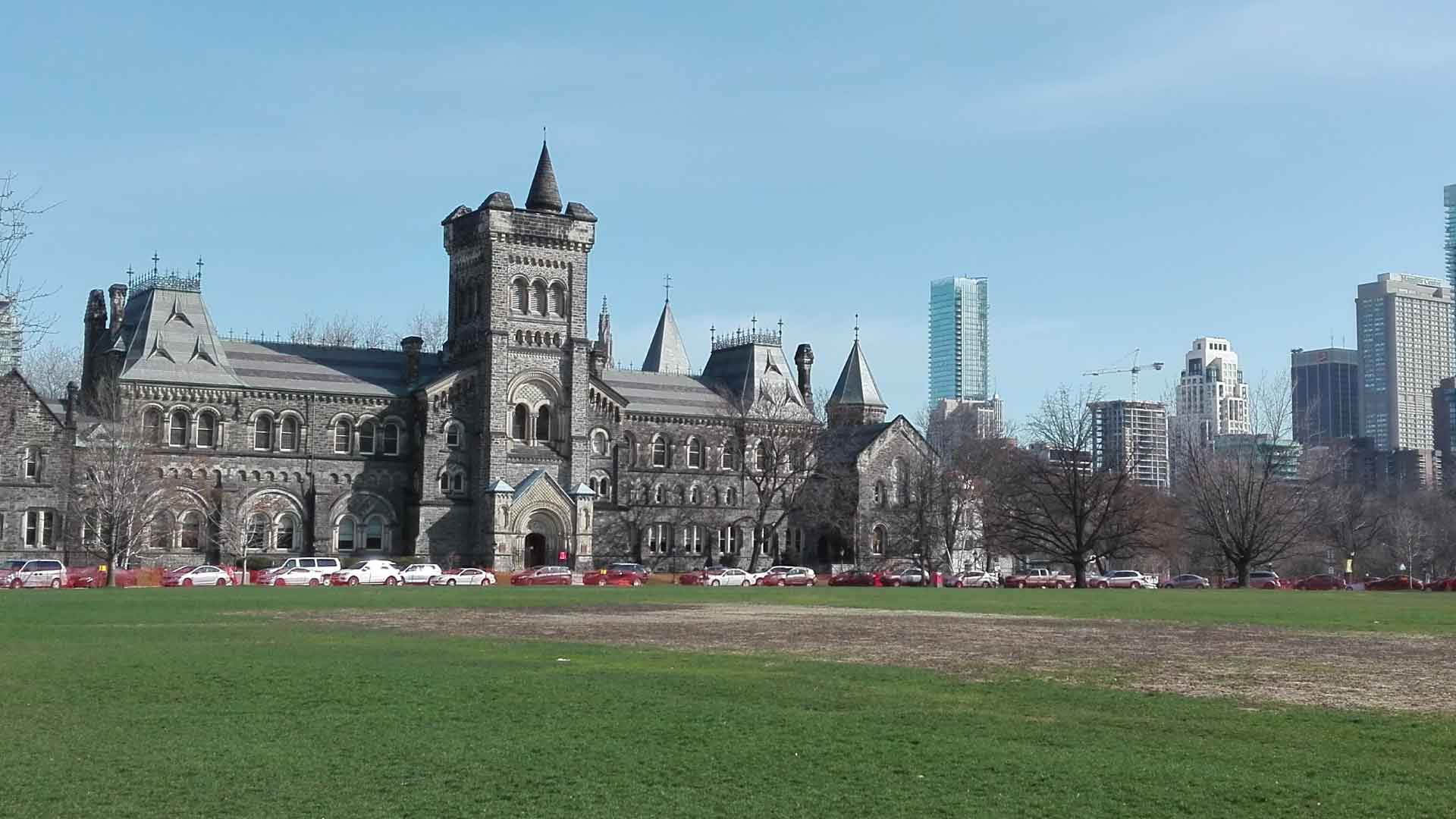 University College at the University of Toronto with the Toronto skyline to the right